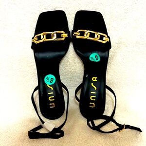 NWT UNISA designed beautiful open black and gold  open shoes .